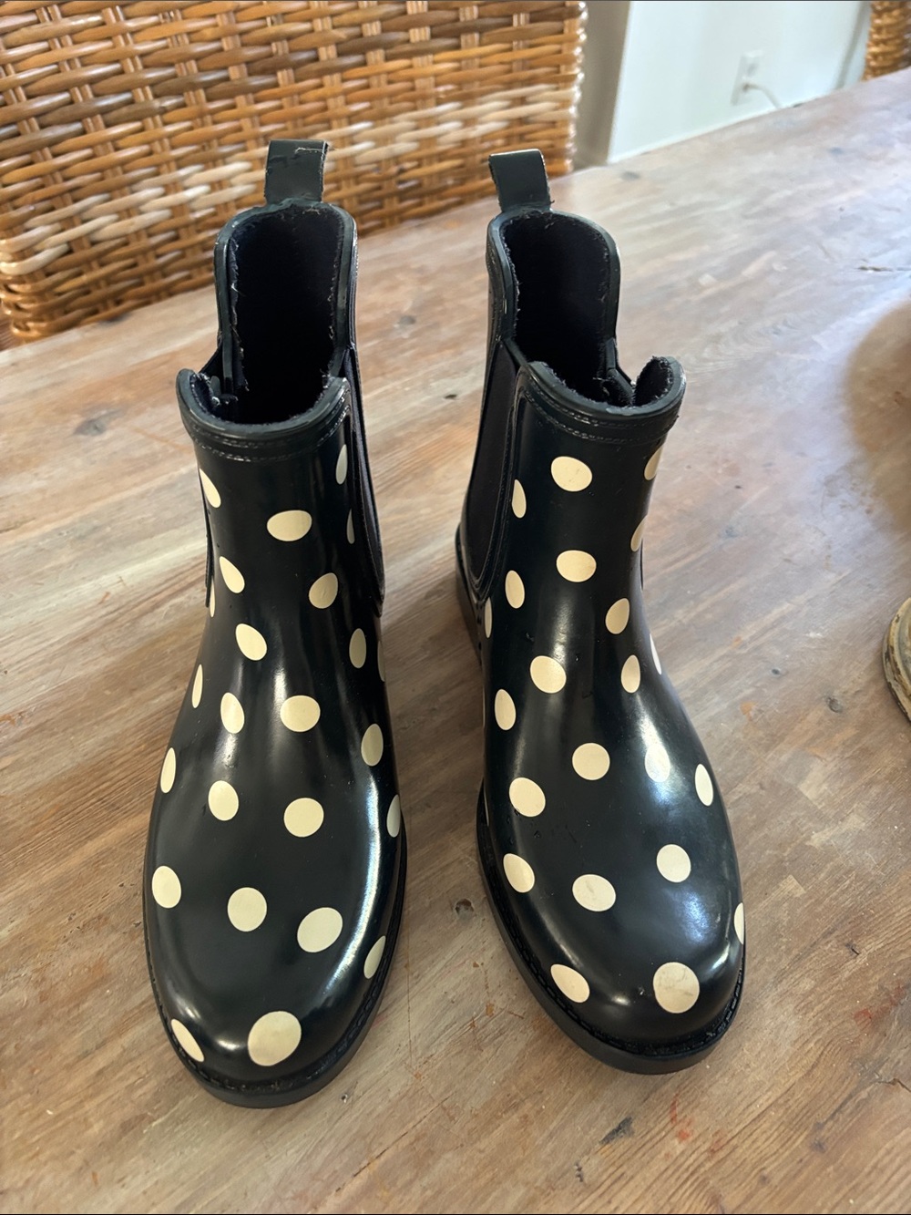Women’s black polka dot rain boots